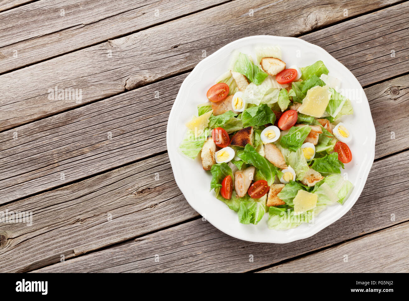 Fresh healthy salad on wooden table. Top view with copy space Stock ...