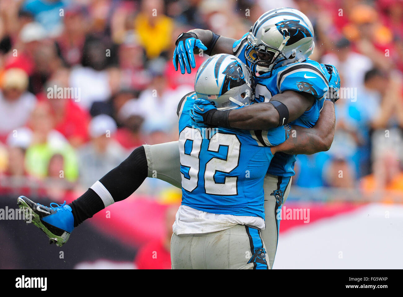 Tamap, Florida, USA. 9th Sep, 2012. Carolina Panthers linebacker Jon Beason (52) and defensive tackle Dwan Edwards (92) cleebrate a defenive pay during the Panthers 16-10 loss to the Tampa Bay Buccaneers at Raymond James Stadium on September 9, 2012 in Tampa, Florida. ZUMA Press/Scott A. Miller. © Scott A. Miller/ZUMA Wire/Alamy Live News Stock Photo