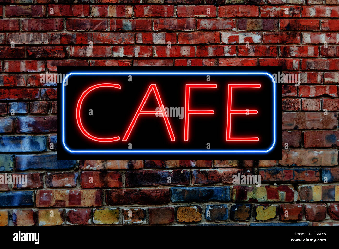 Cafe Neon Sign on a grunge brick wall Stock Photo