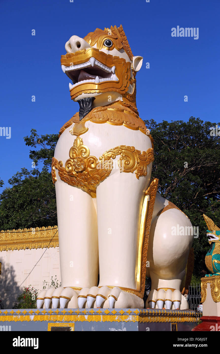 Giant lion statue at the entrance of the Shwedagon Pagoda, Yangon