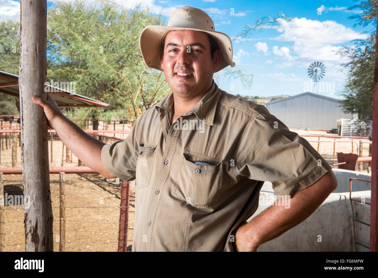 Portrait of sheep and game farmer; Koes, Namibia Stock Photo Alamy