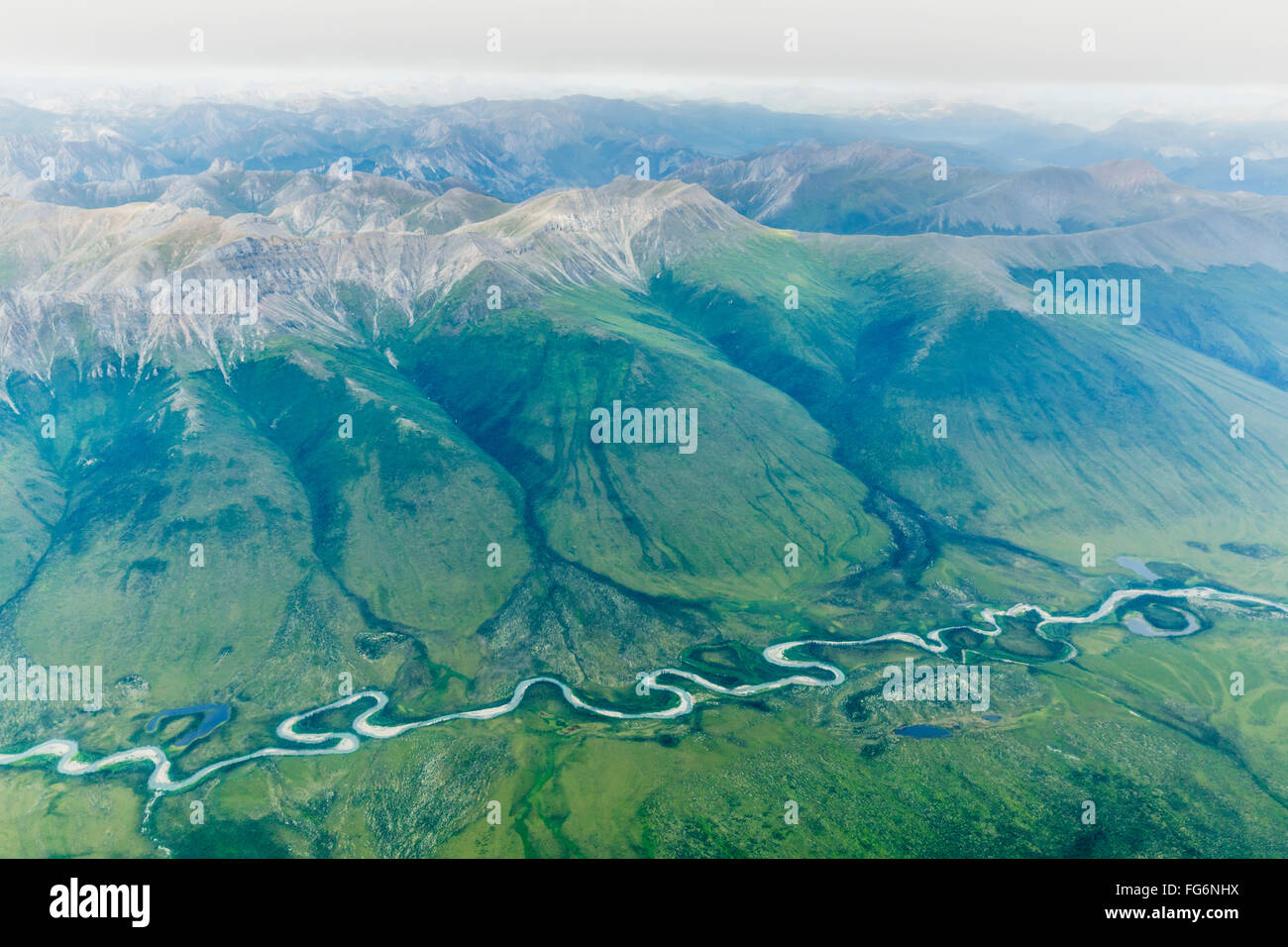 Aerial view of a river cutting through a valley in the Brooks Range
