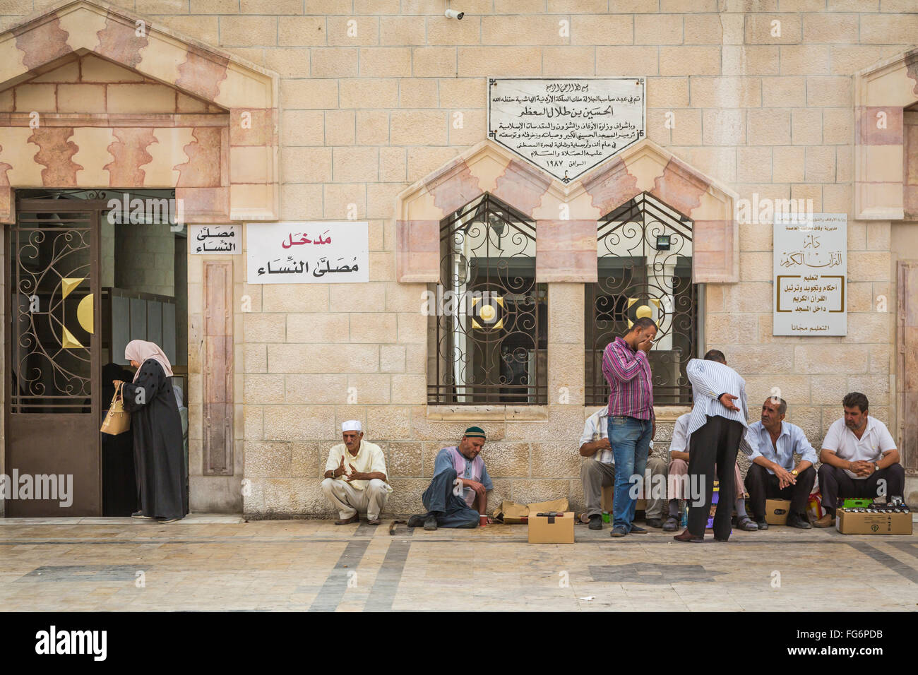A street scene with shops and stores in the old city of Amman