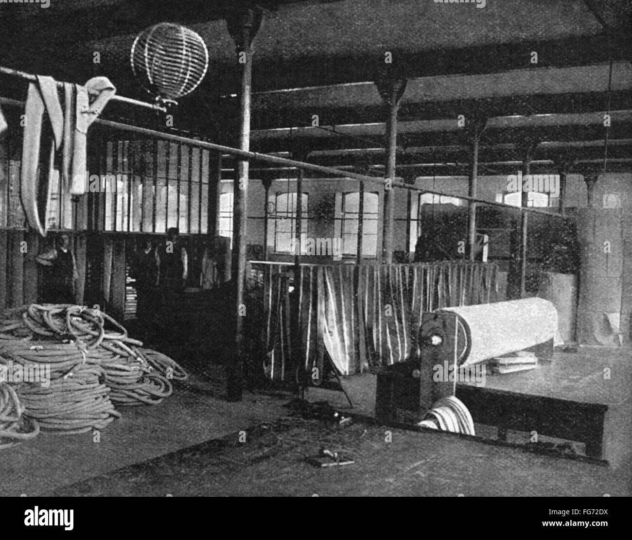 TIRE FACTORY, 1897. /nCanvas-cutting machinery at the Beeston pneumatic tire factory in England. Photograph, 1897. Stock Photo