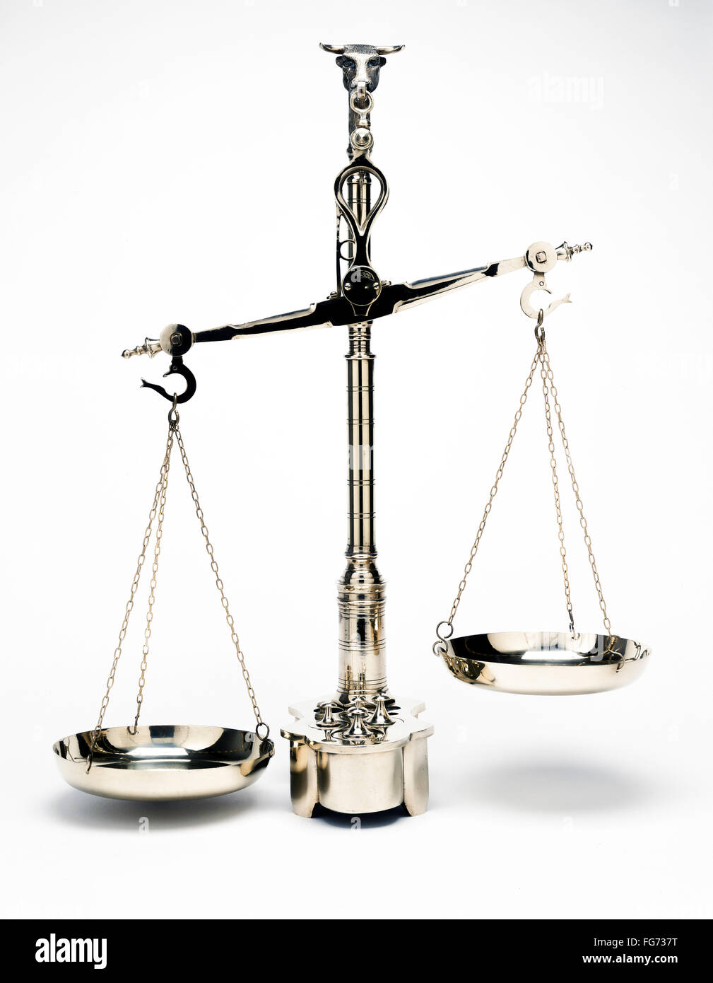 Set of balance scales with white background taken in studio setting Stock Photo