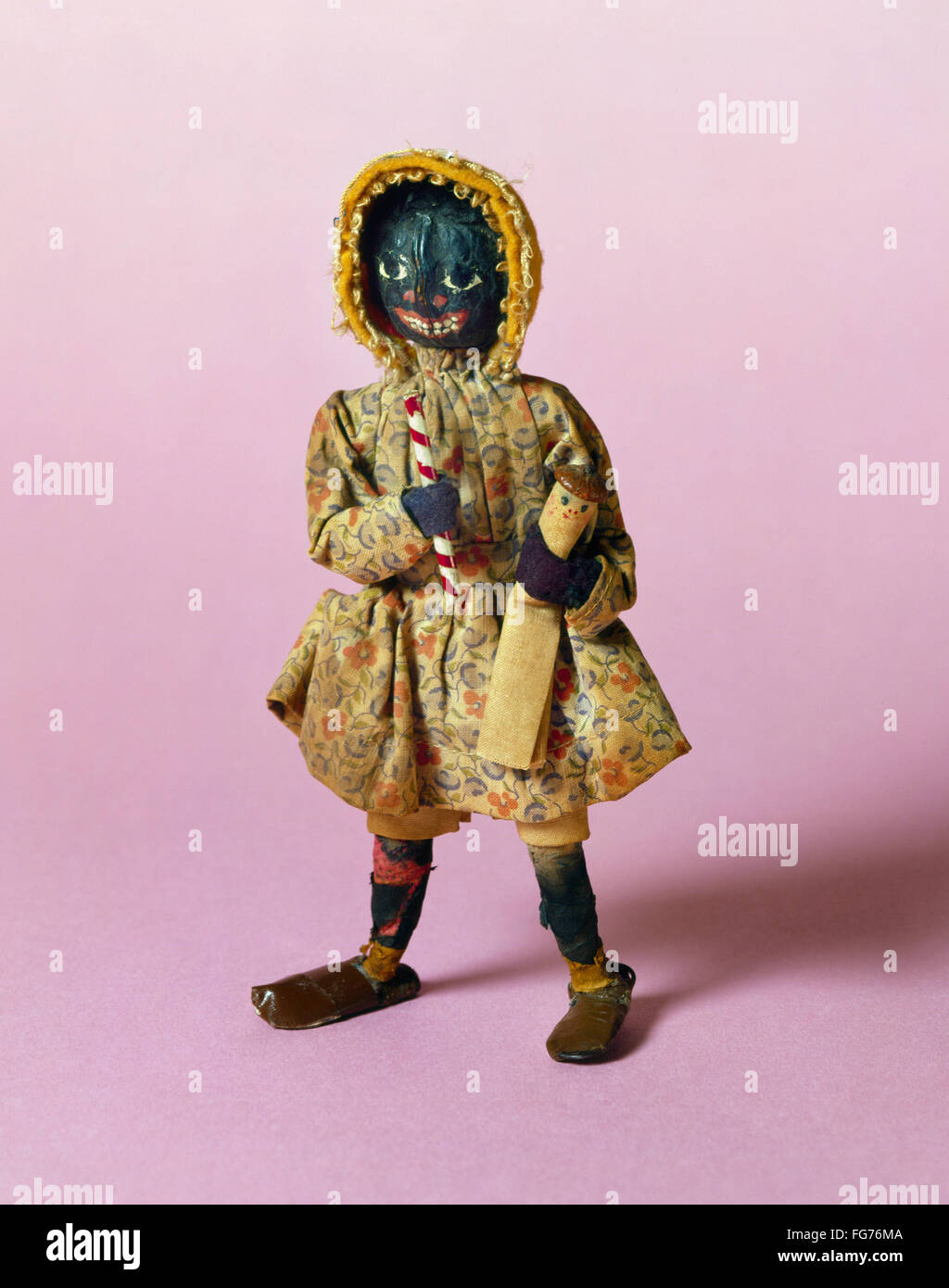 RAGDOLL, c1850. /nHomemade rag doll carrying a doll of her own with an ...