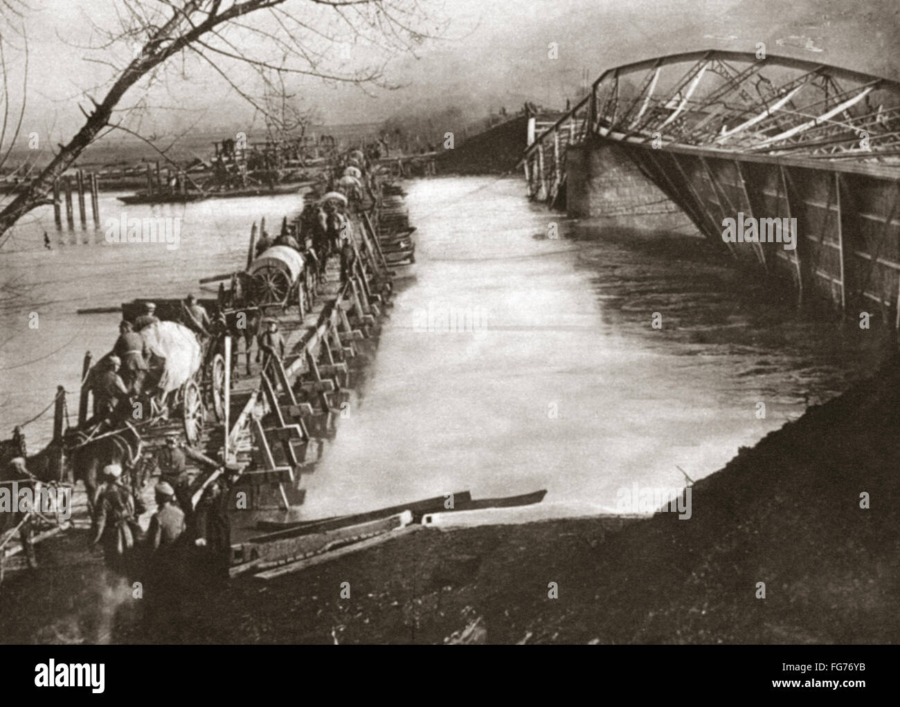 WORLD WAR I: VISTULA RIVER. /nScene on the Vistula River during the Russian retreat bfore Von Mackensen's advance. The Germans are passing over a wooden bridge constructed in place of the destroyed structure, Poland. Photograph, c1916. Stock Photo
