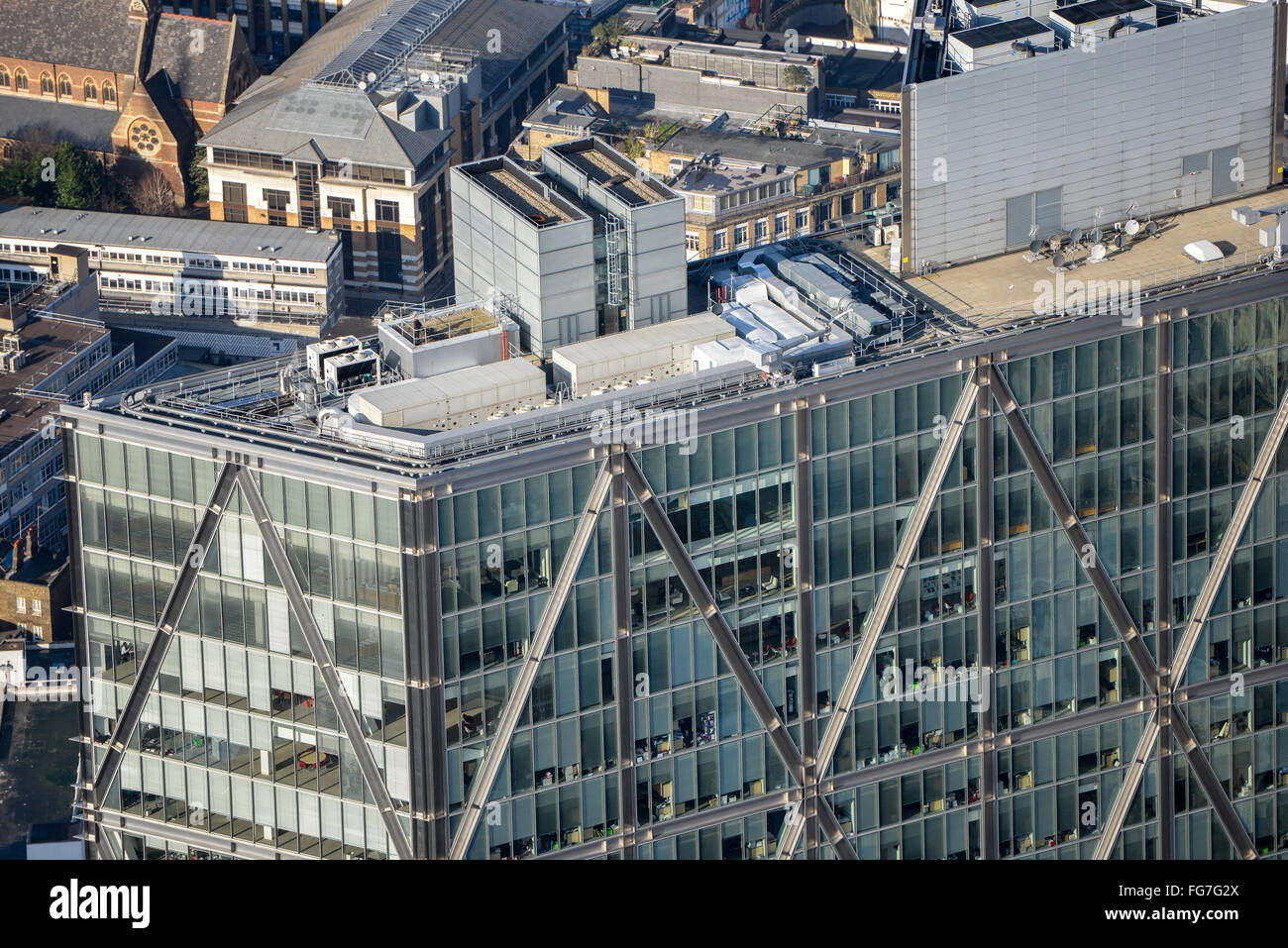 A close up aerial view of the top of Broadgate Tower in the City of ...