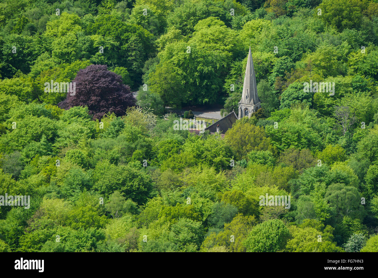 An aerial view of the spire of Loughton High Beach Church poking