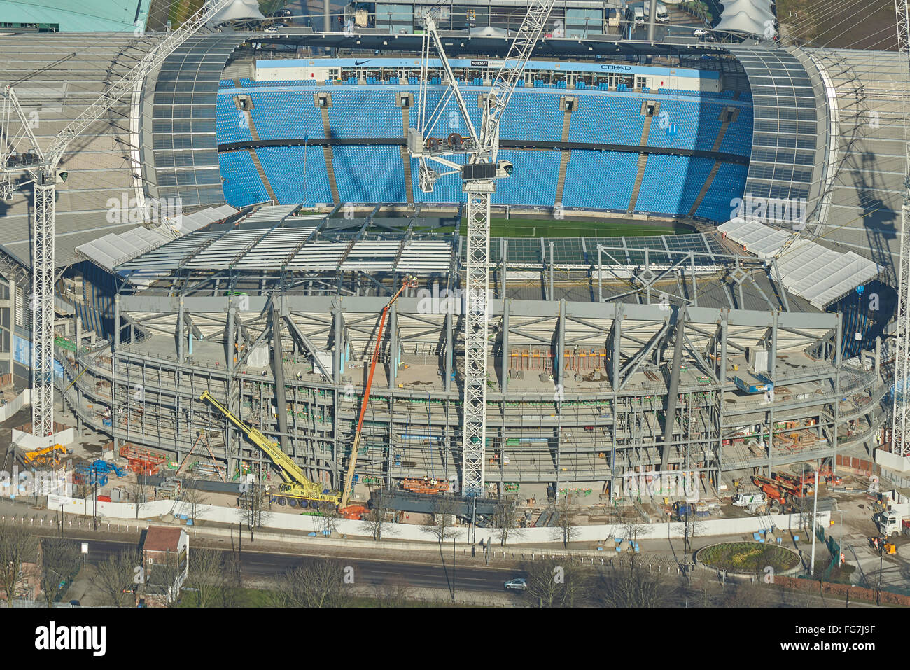 An aerial view of construction work taking place at the City of Manchester Stadium Stock Photo