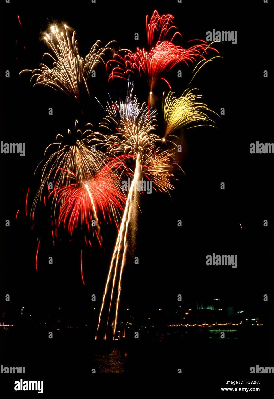 Fireworks display at night, River Thames, London, England, United Kingdom Stock Photo