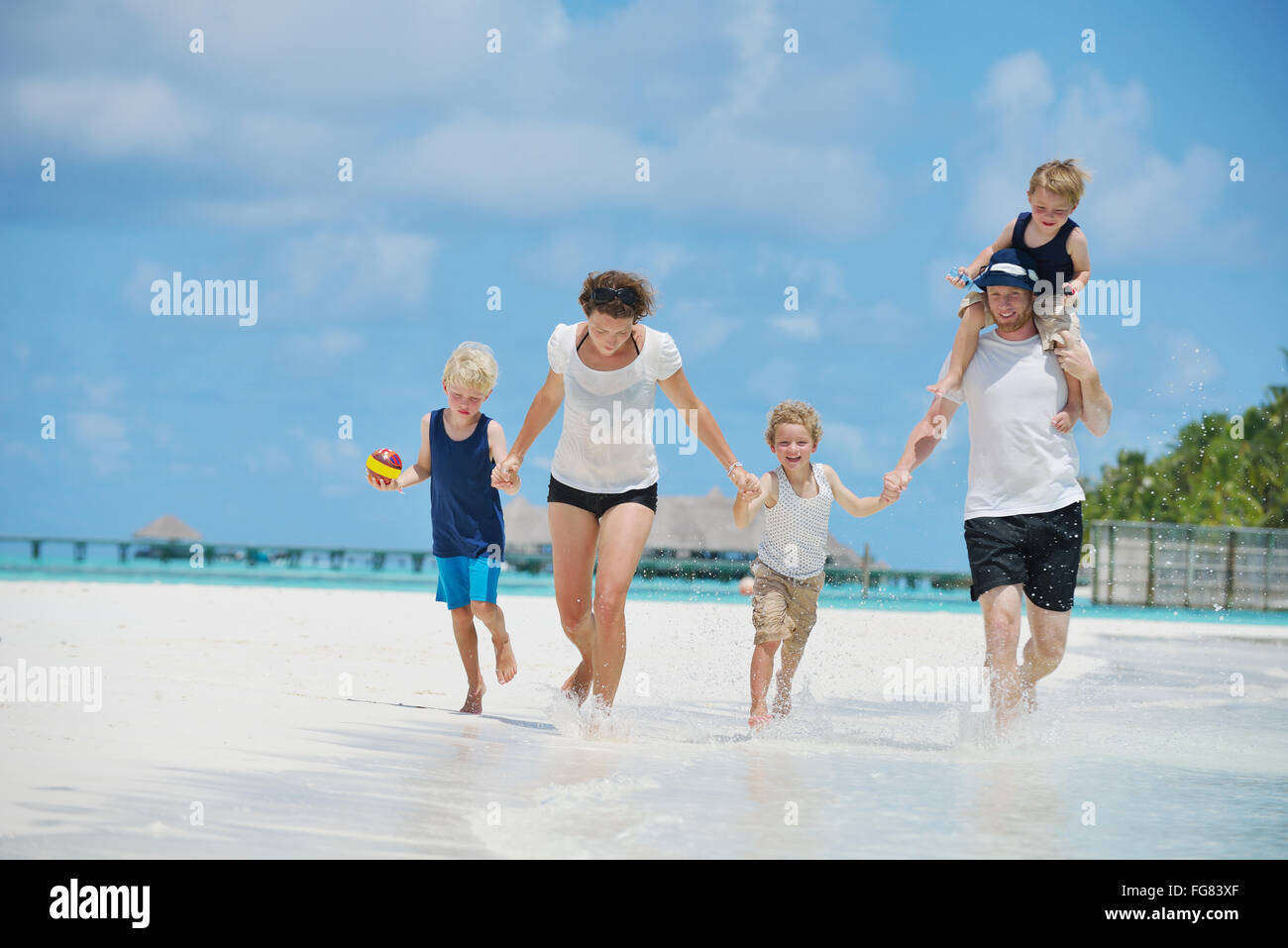 happy family on vacation Stock Photo - Alamy