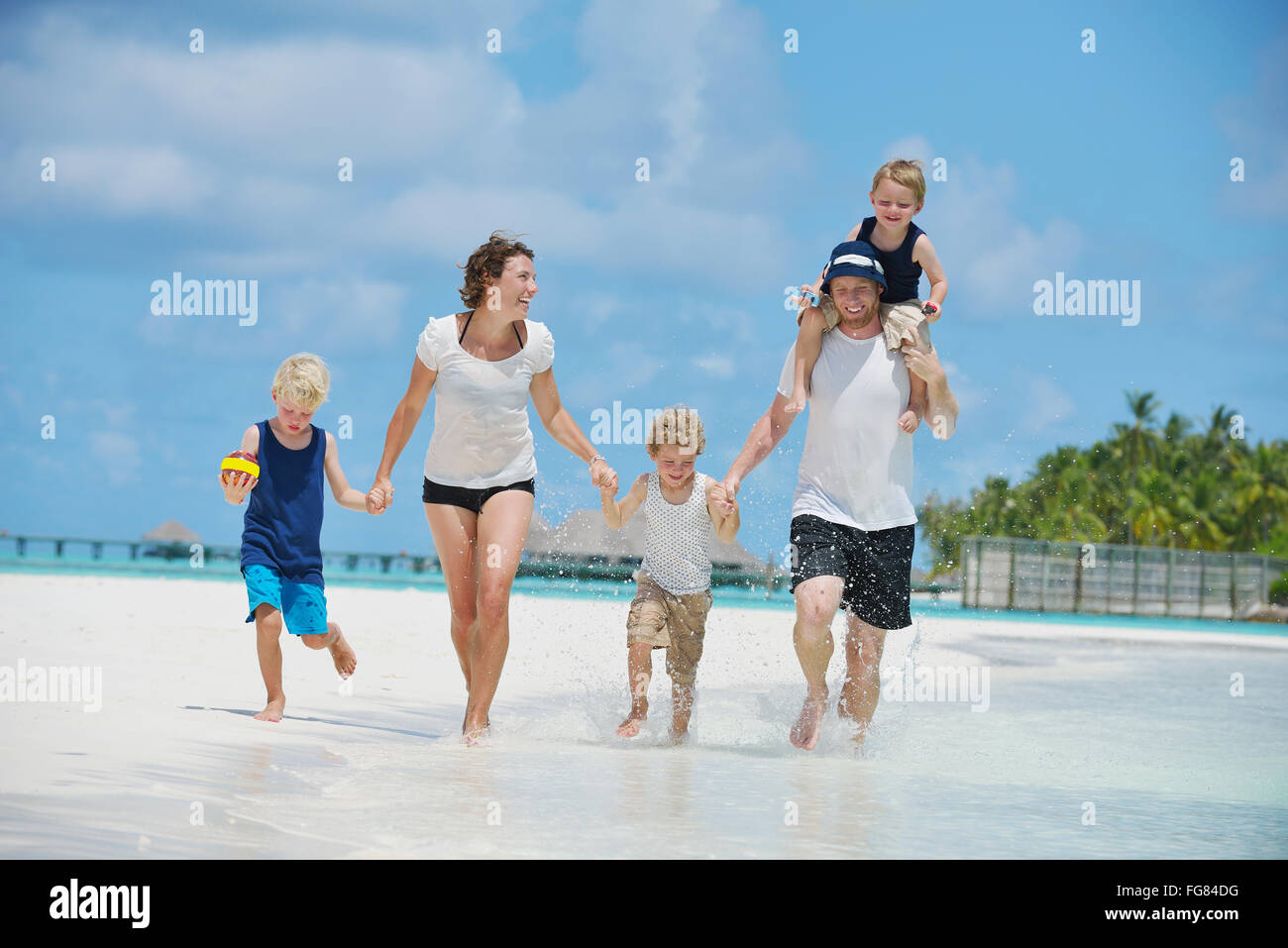 happy family on vacation Stock Photo - Alamy