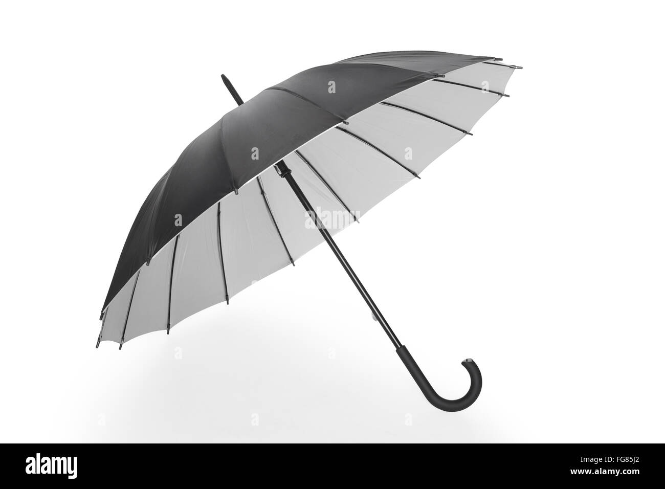 Open black umbrella with soft shadow on white, clipping path Stock Photo