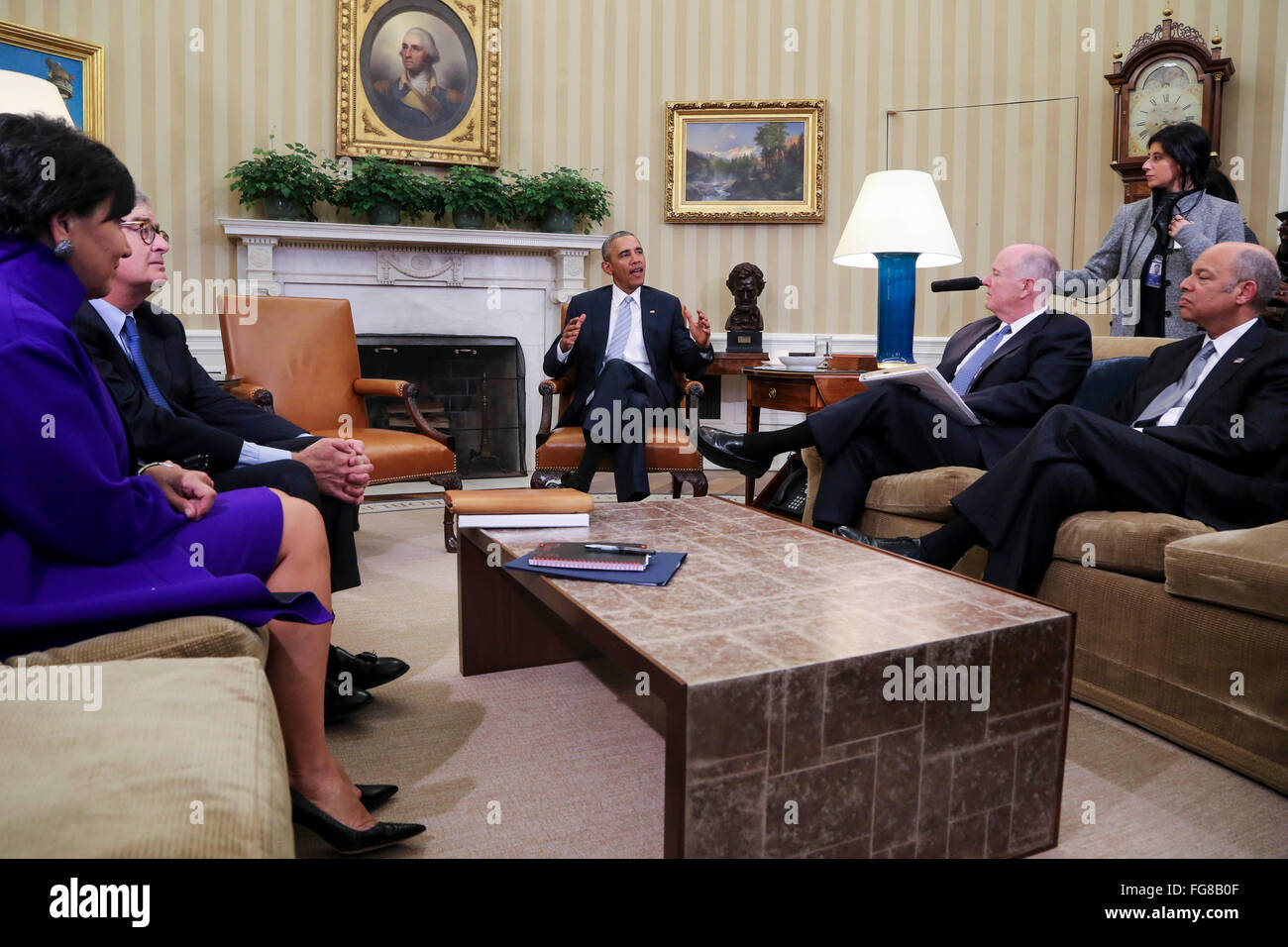 United States President Barack Obama meets with former National Security Advisor Tom Donilon (2R) and former IBM CEO Sam Palmisano (2L), who are being appointed as the Chair and Vice Chair respectively of the Commission on Enhancing National Cybersecurity in the Oval Office of the White House, in Washington, DC, February 17, 2016. Also present during this meeting are Commerce Secretary Penny Pritzker (L) and Secretary of Homeland Security Jeh Johnson (R). Credit: Aude Guerrucci/Pool via CNP - NO WIRE SERVICE - Stock Photo