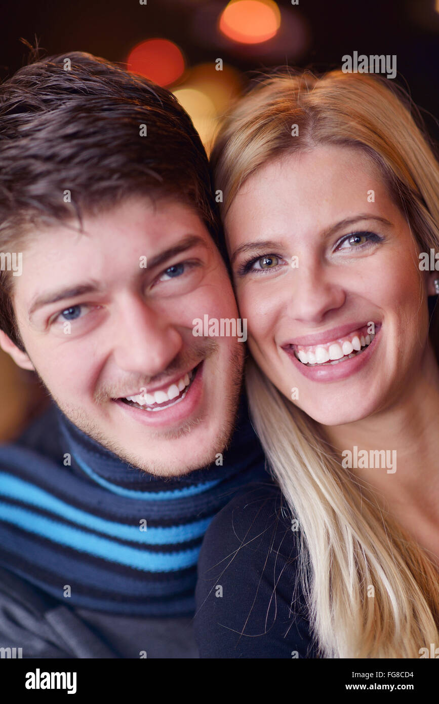 Portrait of a happy young couple Stock Photo - Alamy