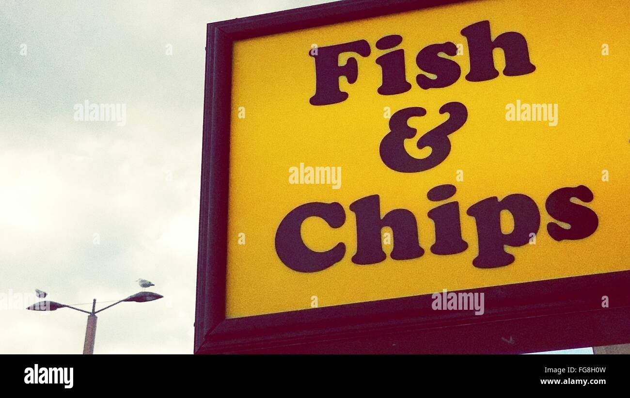 Close-Up Of Fish And Chips Sign Stock Photo