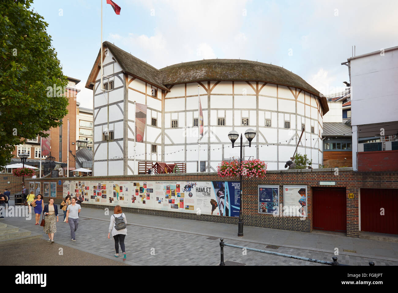 People passing near The Globe Theater in London Stock Photo