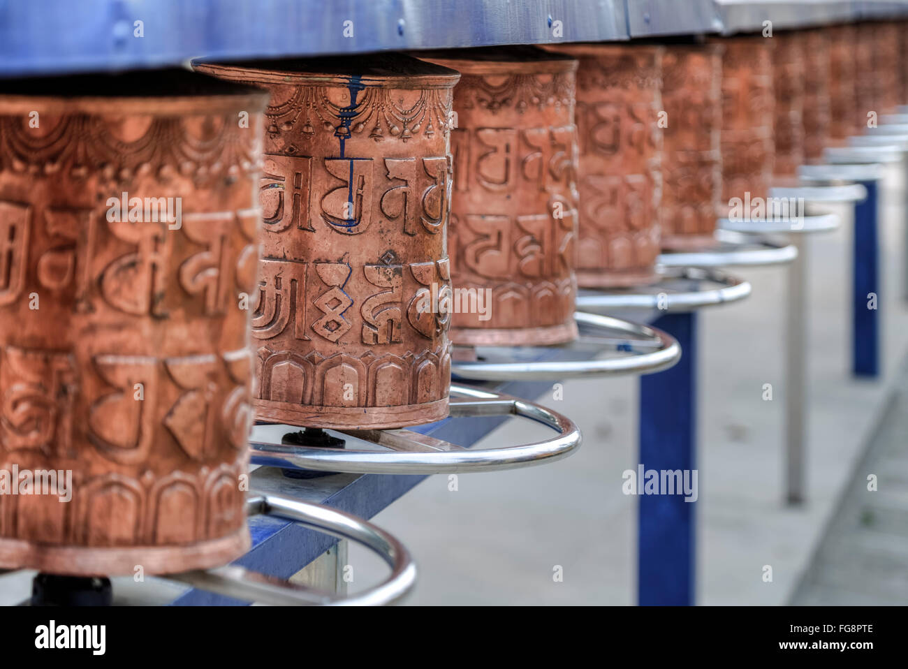 Tibetan prayer wheels in Sarnath Temple, Varanasi, Uttar Pradesh, India Stock Photo