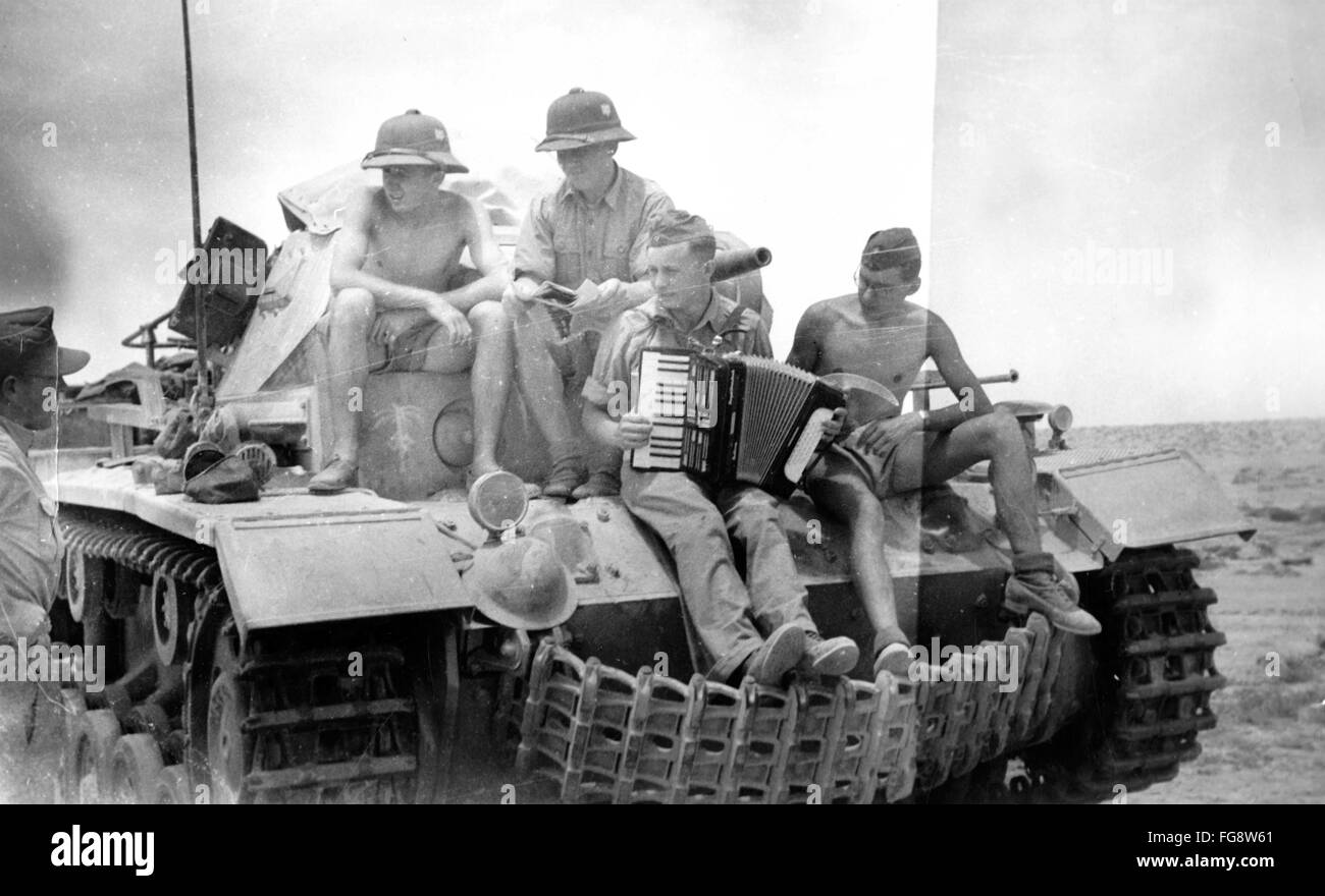 The Nazi propaganda picture shows Afrika Korps soldiers of the German Wehrmacht on a tank in North Africa. Date unknown (1941-1943). Fotoarchiv für Zeitgeschichtee - NO WIRE SERVICE - Stock Photo