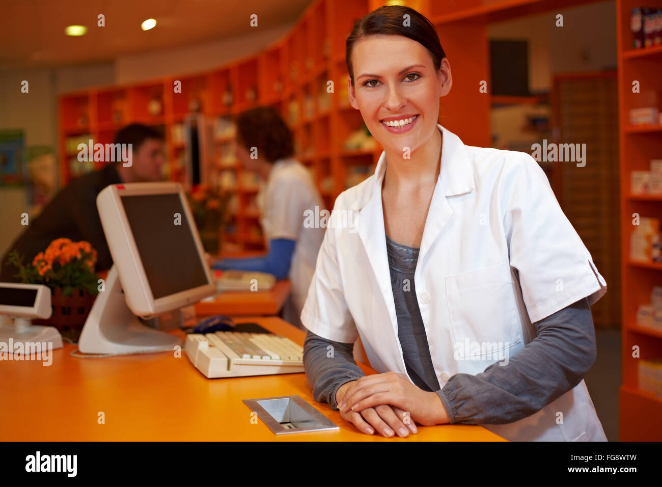 Pharmacist behind counter hi-res stock photography and images - Alamy