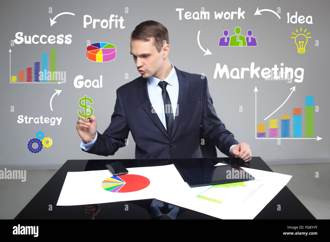 Businessman points to the dollar sign. profitable business concept