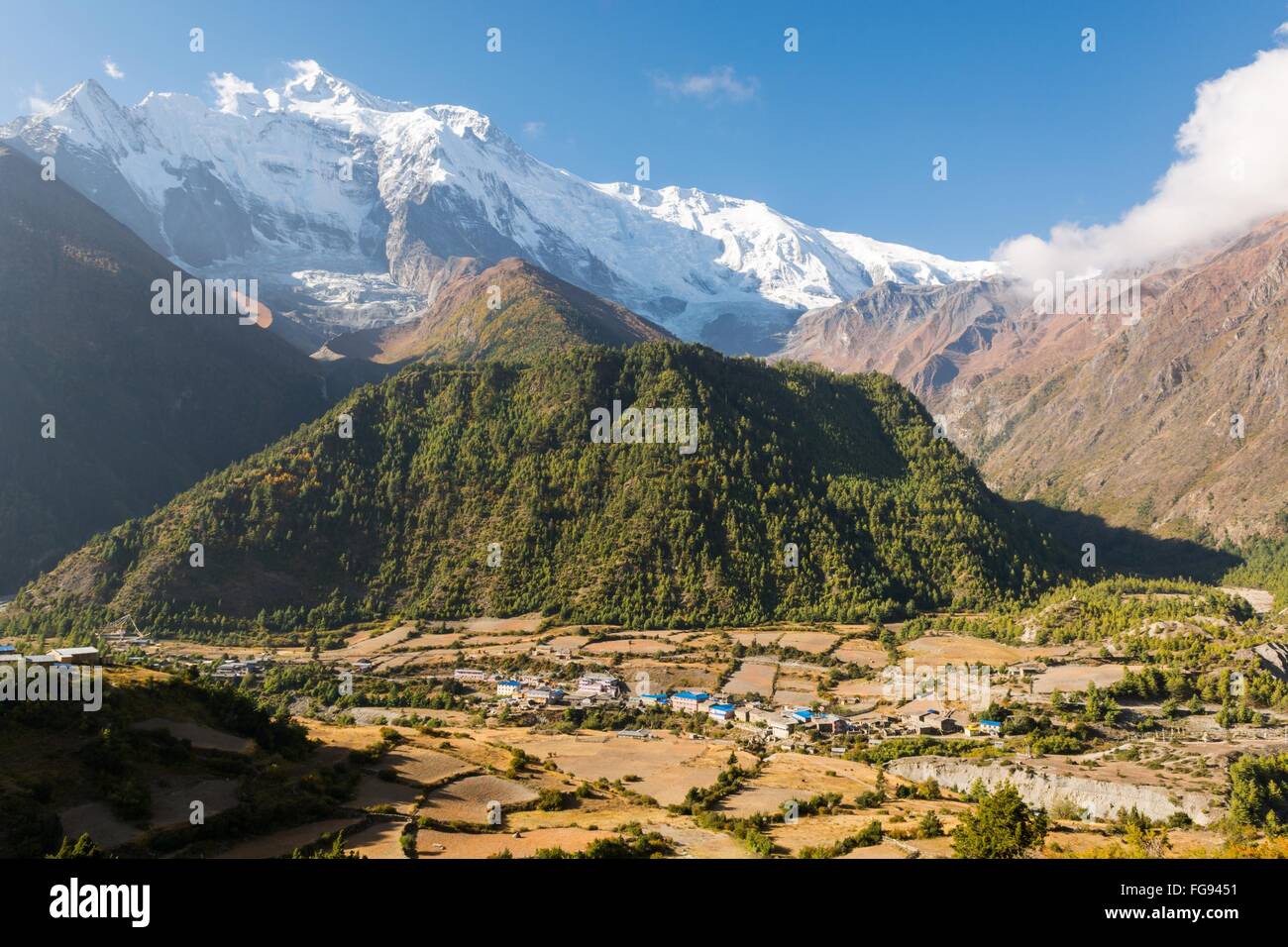 Panoramic mountain view with village Stock Photo - Alamy
