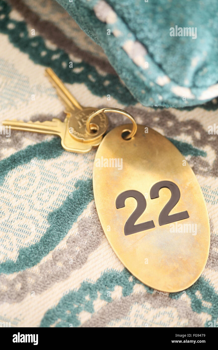 hotel-keys-on-bed-stock-photo-alamy