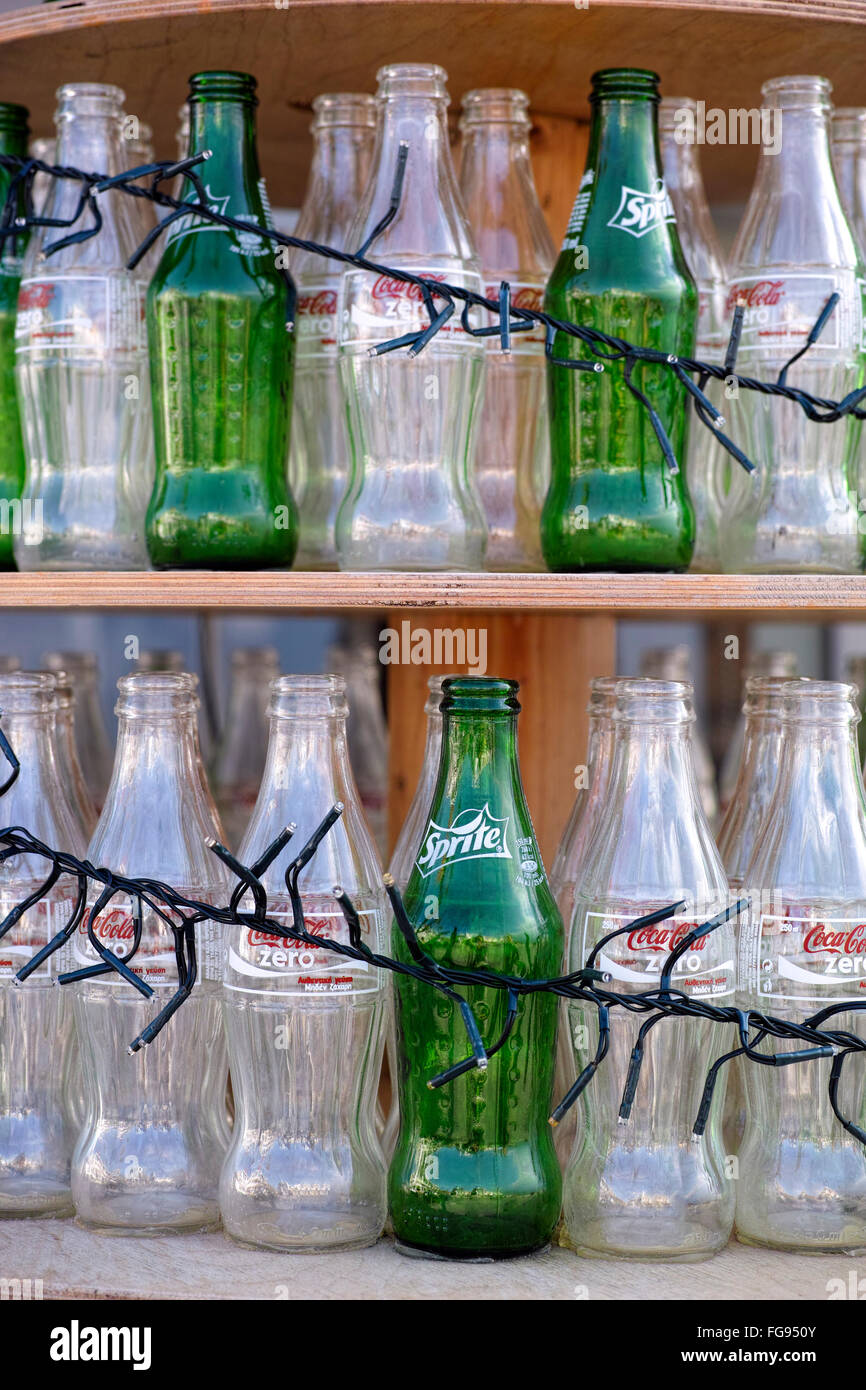 Paphos, Cyprus December 11, 2015 Empty bottles of CocaCola and Sprite standing on shelves
