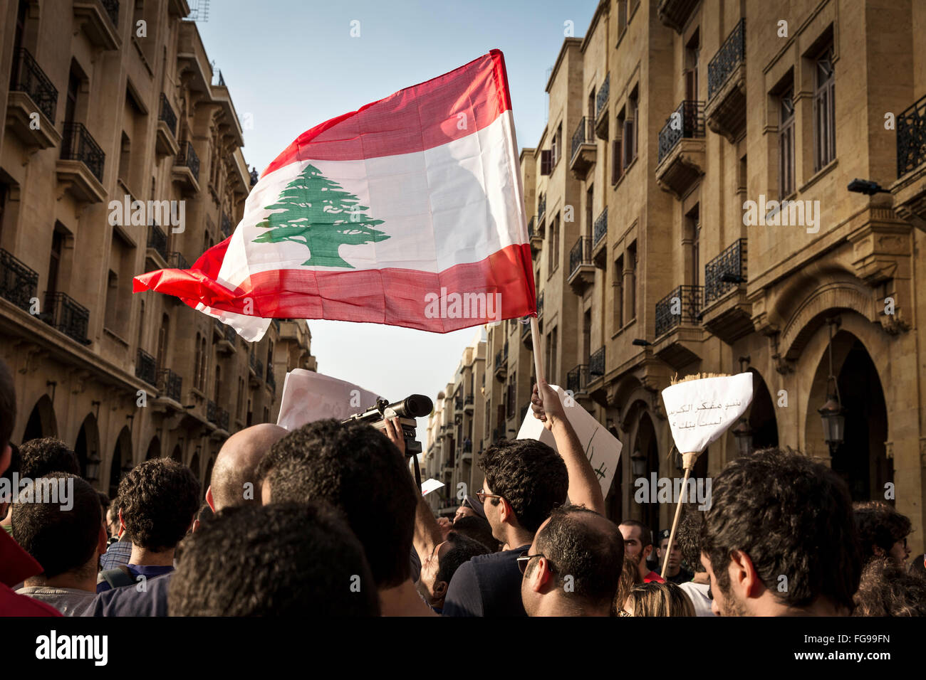 Young demonstrators protesting in Downtown Beirut against the change in the legislature by the government. Stock Photo