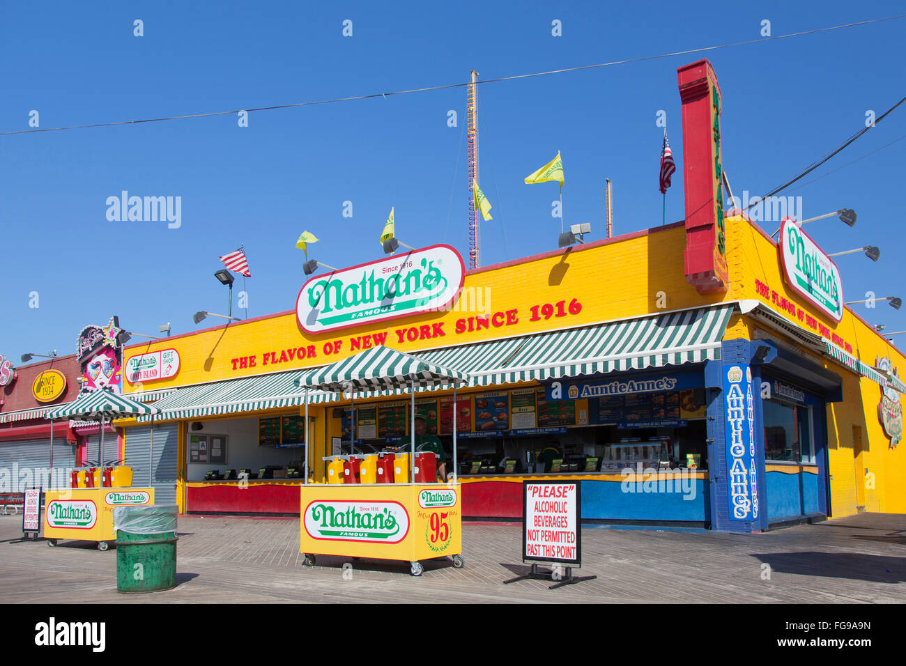 new york city, 15 september 2015: nathan's famous restaurant in bright colors on coney island on sunny morning Stock Photo