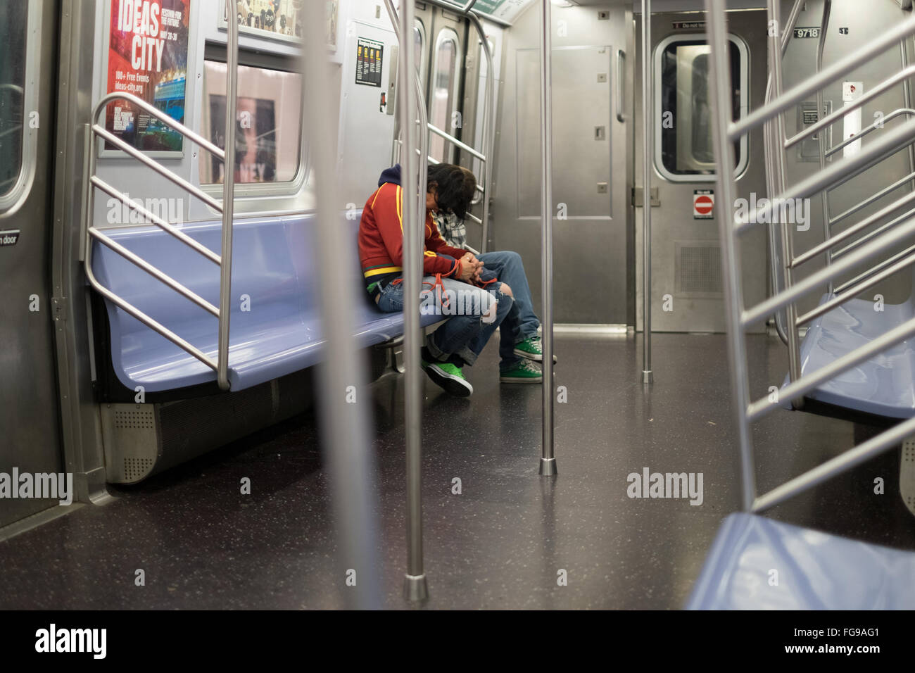 Sleeping in an almost empty New York City subway car Stock Photo - Alamy