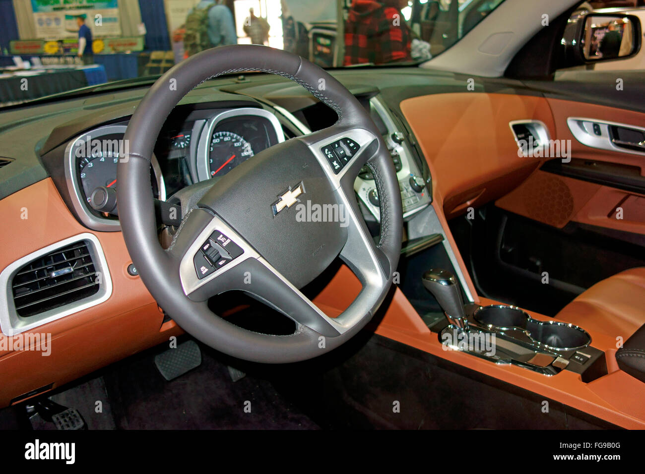 The dash, steering wheel and instruments of a 2016 GMC Chevrolet Chevy