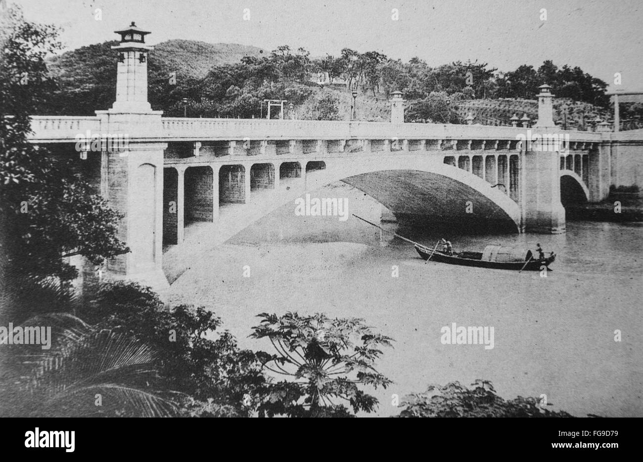 Modernization of Taiwan under Japanese rule. Meiji Bridge ( now Zhongshan Bridge), Taipei, Taiwan. Before 1940. Stock Photo