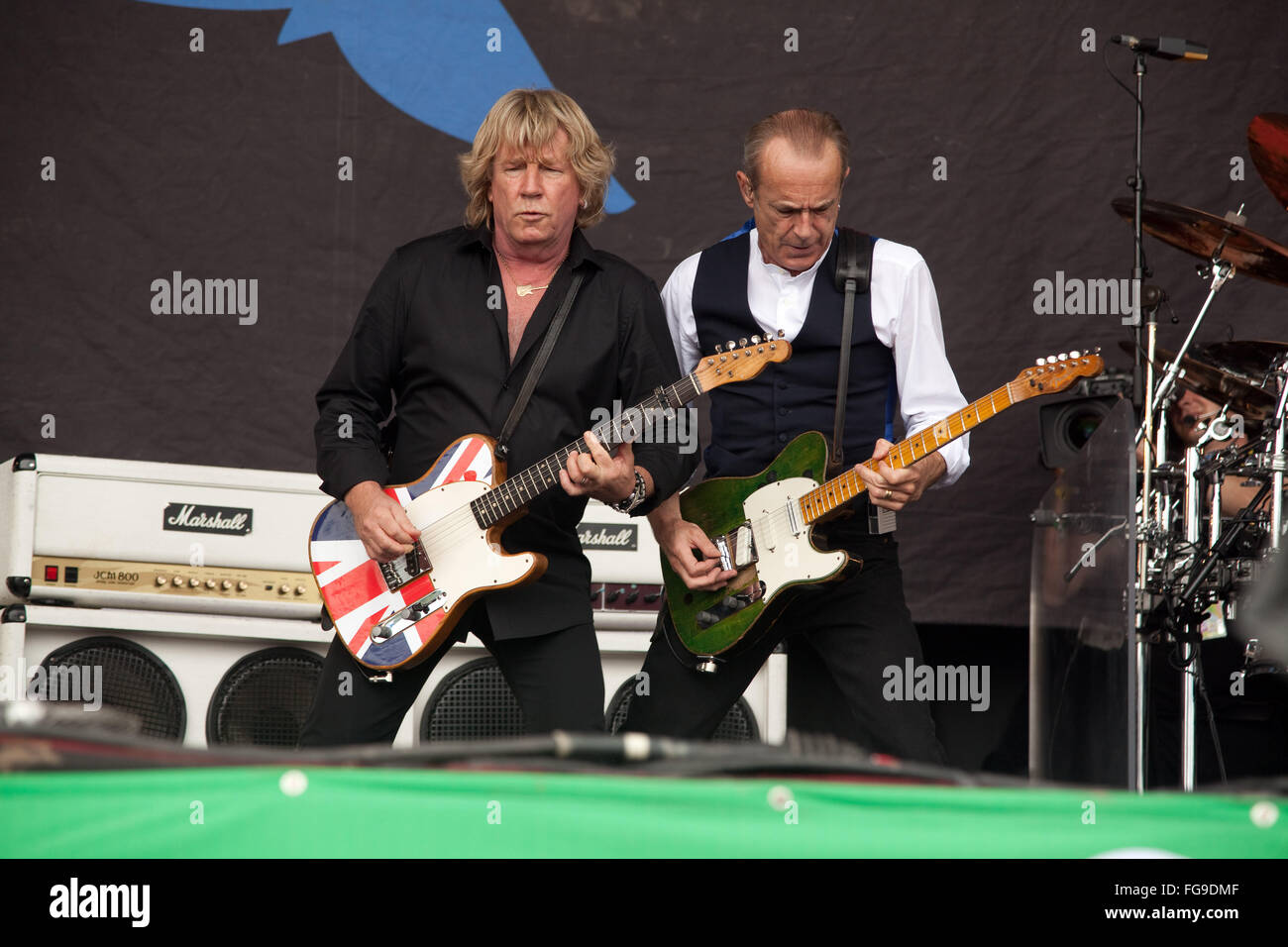Status Quo performing on the Pyramid Stage, Glastonbury Festival 2009