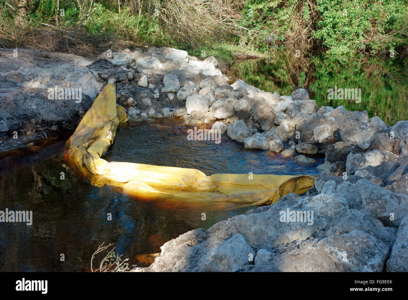 a dam and silt trap on a ditch in florida, usa Stock Photo