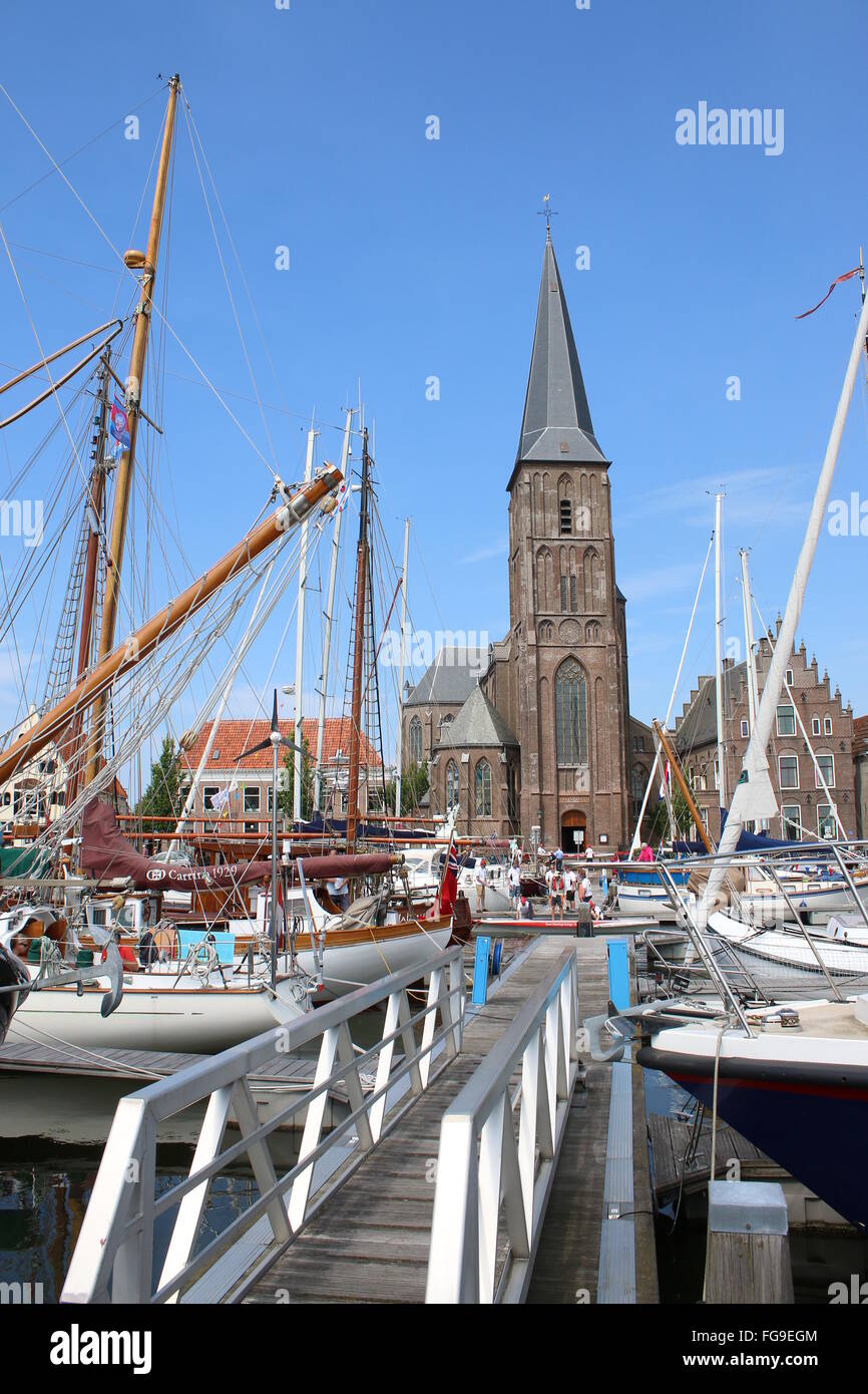 Marina and Sint Michaëlkerk  (Saint Michael's church) at  Zuiderhaven (Southern harbour) in Harlingen, The Netherlands Stock Photo