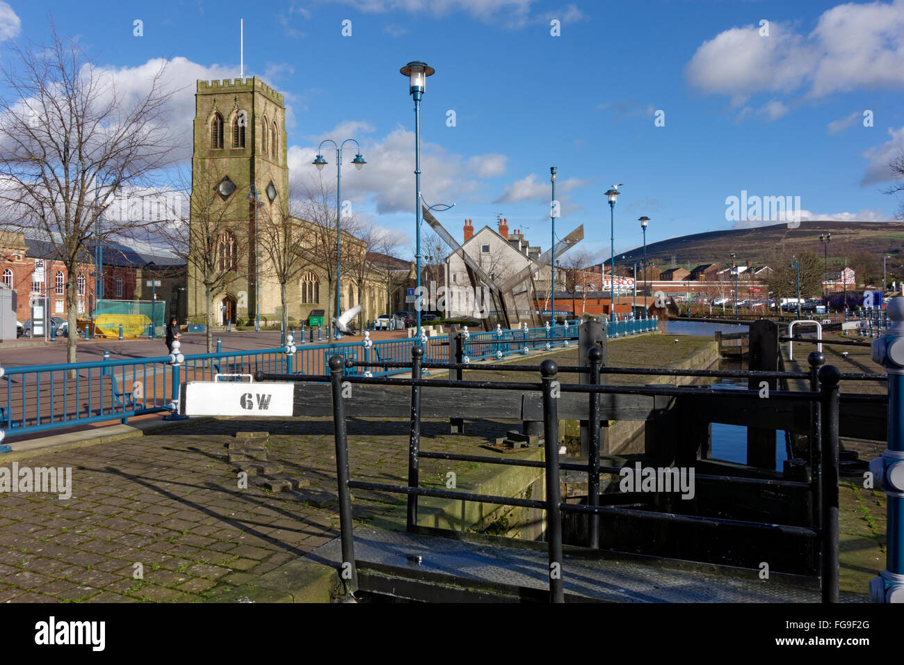 Huddersfield Narrow Canal and Holy Trinity Church, Stalybridge, Cheshire, England, UK. Stock Photo