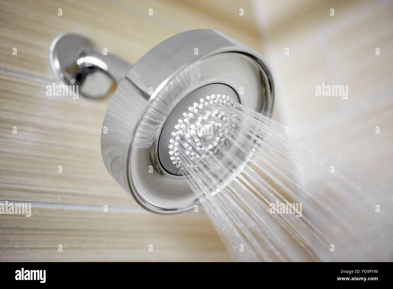 Shower head spraying water in a luxury hotel bathroom Stock Photo Alamy