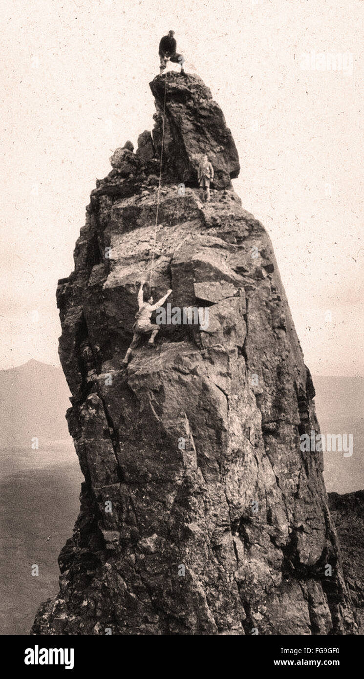 Climbing the Inaccessible Pinnacle     Skye     Scotland     1920 Stock Photo