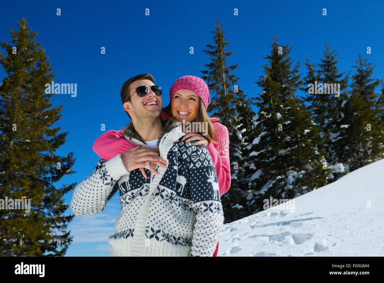 young couple on winter vacation Stock Photo - Alamy