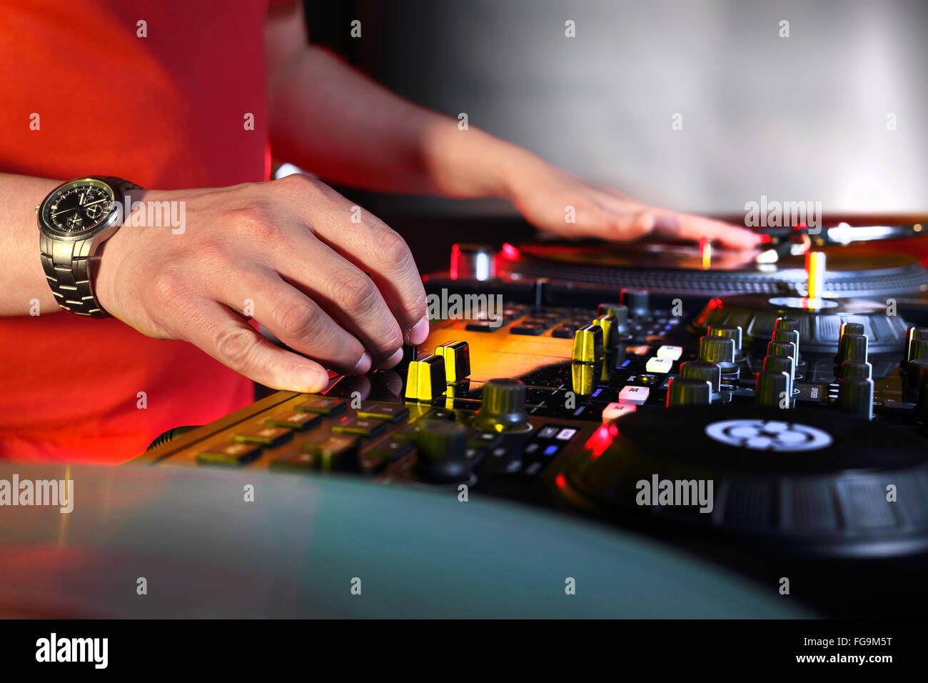 Music from vinyl. Mixing console, DJ job in the disco. vinyl, music