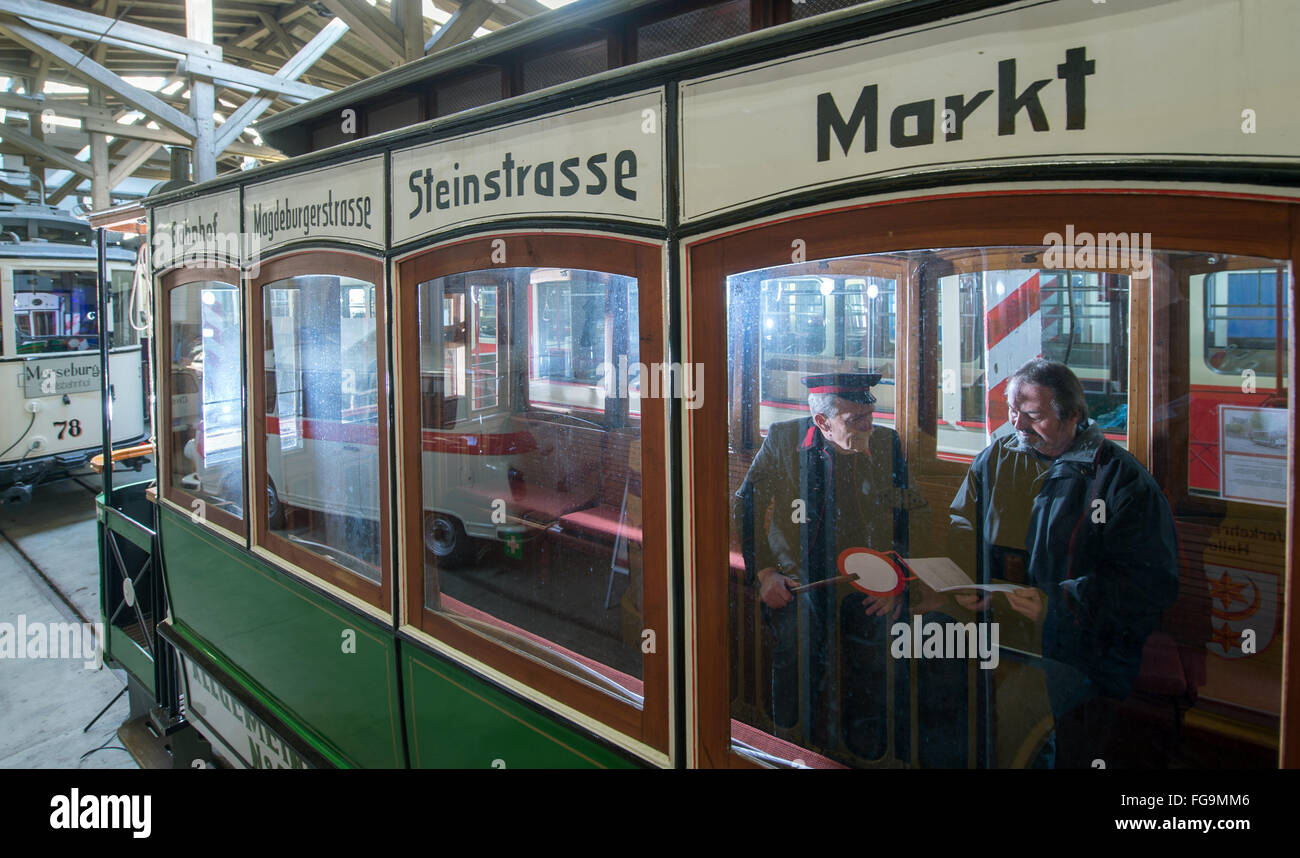 Harald Mey and Manfred Schumann sitting in historical tram carriage in the tram museum in Halle, Germany, 18 February 2016. Halle is known as a pioneering city in the tram history with the first electrical tram network in Europe, having been erected in 1891. In the central station, the exhibition '125 Jahre elektrisiert durch Halle (Saale)' (lit. '125 years electrified through Halle') is opening tonight. PHOTO: HENDRICK SCHMIDT/dpa Stock Photo