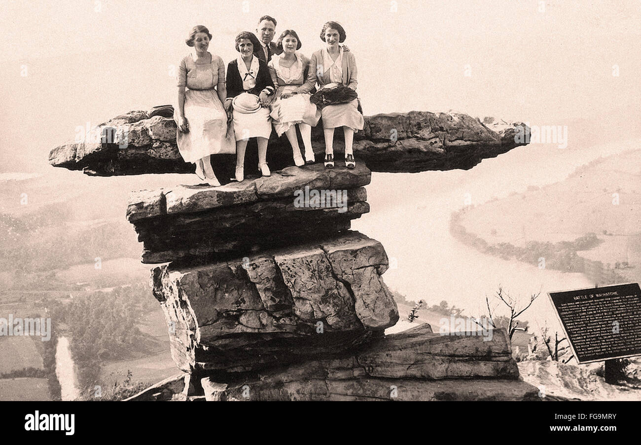 group posing at Umbrella Rock in the 20's Stock Photo