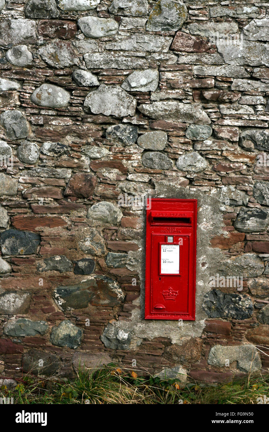 Traditional red postbox in rural stone wall Stock Photo - Alamy