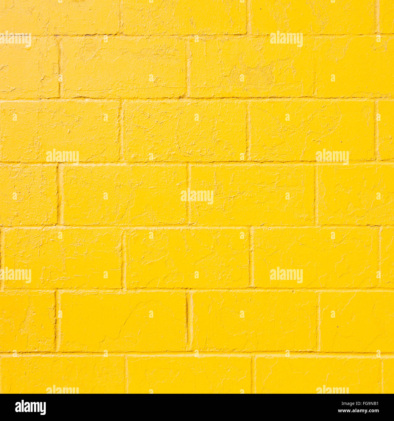 square part of bright yellow painted brick block wall Stock Photo Alamy