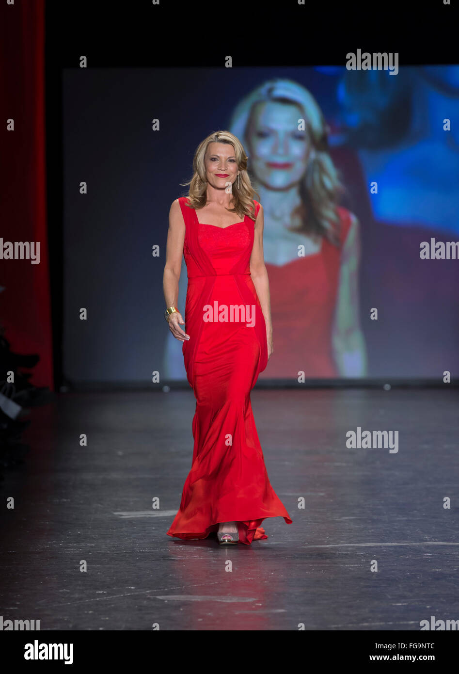 NEW YORK, NY - FEBRUARY 11, 2016: Vanna White wearing dress by Lee-Lim walks runway for the Heart Truth Red Dress Collection 2016 fashion show at Moynihan Station Stock Photo