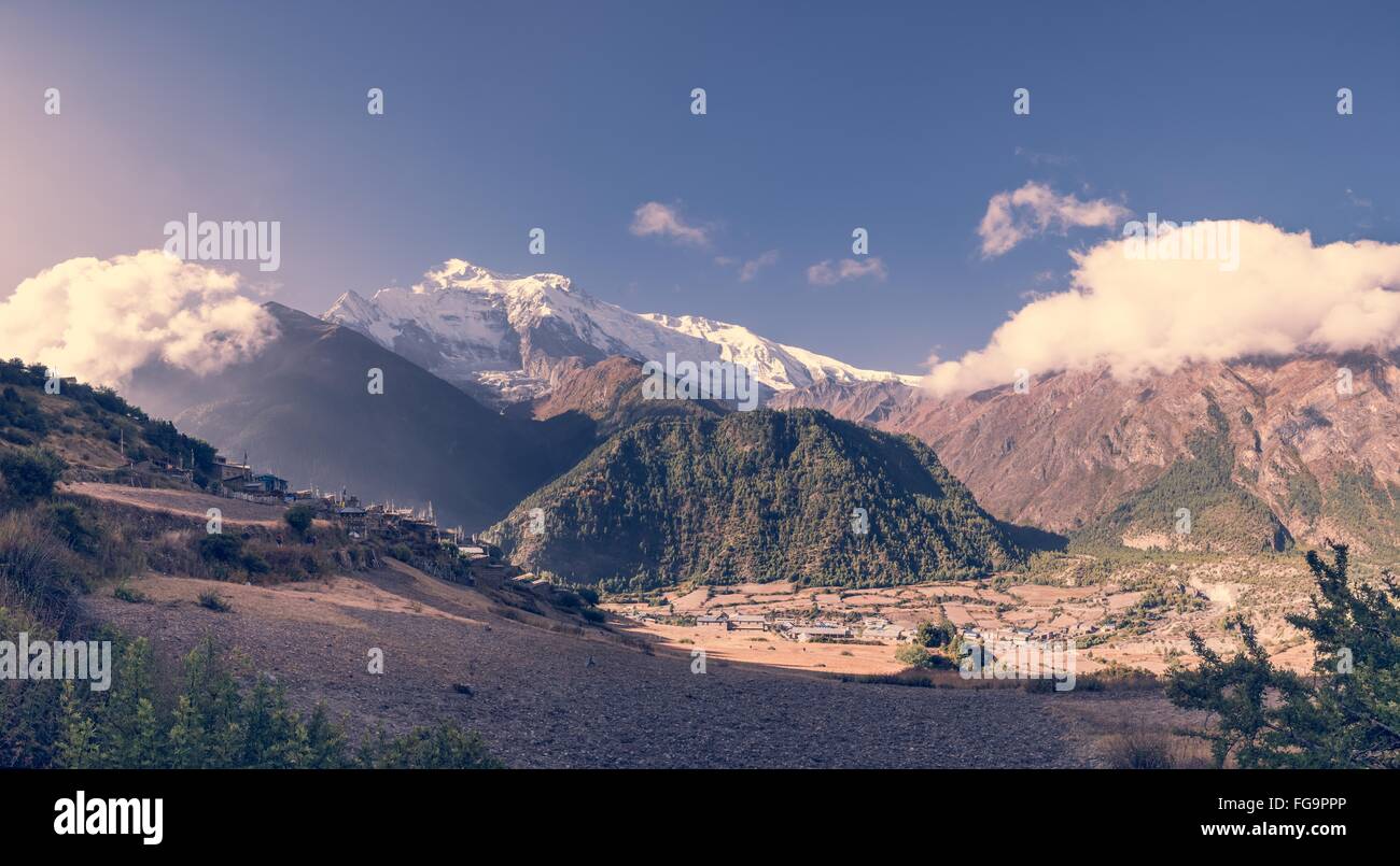 Panoramic mountain view with village Stock Photo - Alamy