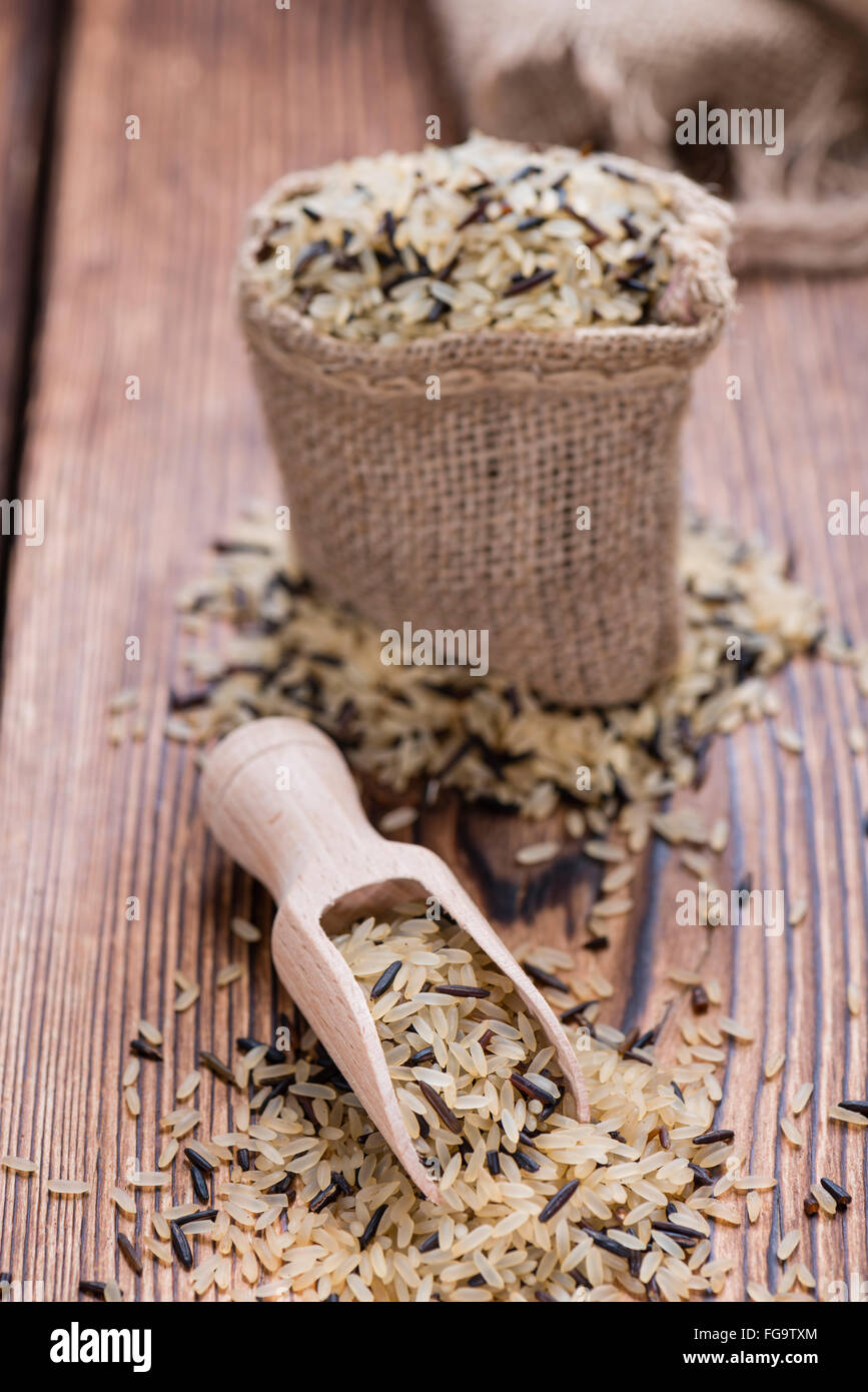 Uncooked Rice (mixed with wild Rice) on rustic background Stock Photo ...