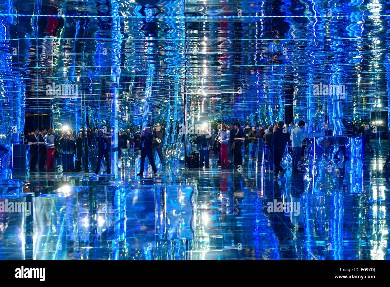 Madrid, Spain. 18th February 2016. The Art Room surrounded by mirrors. The Bombay Sapphire have designed the MBFW 2016 Madrid kissing room with a spacious blue themed mirror surround hall, #TheatreRoom,  and The Art Room, with large LED screen that reflects the movements of people using Wii type technology at MBFW 2016 Madrid, Spain. Credit:  Lawrence JC Baron/Alamy Live News. Stock Photo